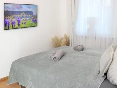 Ein Bett oder Betten in einem Zimmer der Unterkunft Heimat Goslar Apartments 