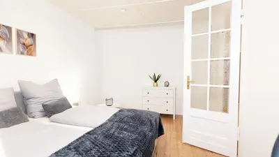 Ein Bett oder Betten in einem Zimmer der Unterkunft ADresseApartments 1 - Altstadtrand & Parkplatz