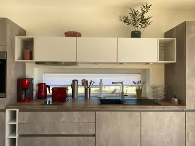 Küche/Küchenzeile in der Unterkunft Ferienhaus Mountain View Six53 mit Sauna und Kamin in St. Andreasberg