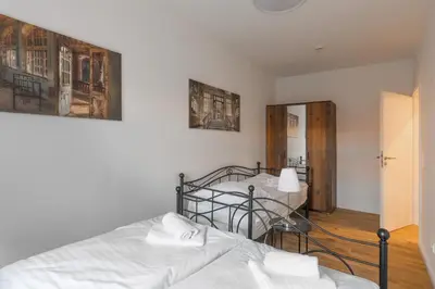 Ein Bett oder Betten in einem Zimmer der Unterkunft Ferienhaus Bavaria WR - Ferienwohnung Zefix