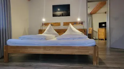 Ein Bett oder Betten in einem Zimmer der Unterkunft Ferienwohnung Bocksberg Hahnenklee