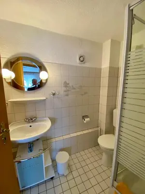 Ein Badezimmer in der Unterkunft Ferienwohnung WACHE im HAUS GERLACH