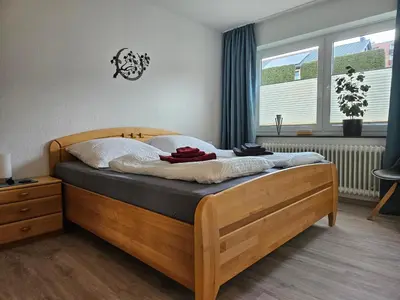 Ein Bett oder Betten in einem Zimmer der Unterkunft Ferienwohnung Hoch im Harz, Altenau