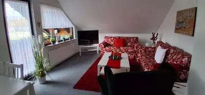 Ein Sitzbereich in der Unterkunft Haus Kalli
