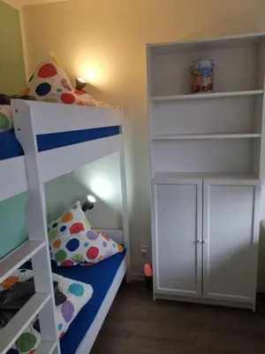 Ein Bett oder Betten in einem Zimmer der Unterkunft Apartment KY481 im PanoramicHohegeiß
