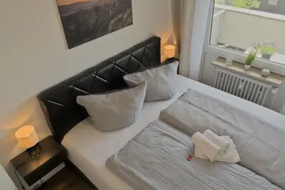 Ein Bett oder Betten in einem Zimmer der Unterkunft Harzabenteuer - Biken, Wandern, Tierliebe & Stil