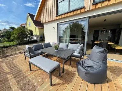 Ein Sitzbereich in der Unterkunft Ferienhaus Mountain View Six50 mit Sauna und Kamin in St. Andreasberg