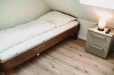 Ein Bett oder Betten in einem Zimmer der Unterkunft Sonneneck 2