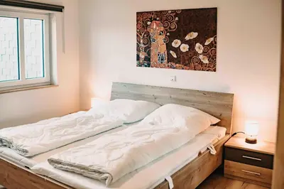 Ein Bett oder Betten in einem Zimmer der Unterkunft Sonneneck 2