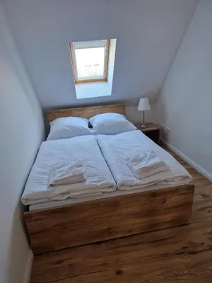 Ein Bett oder Betten in einem Zimmer der Unterkunft Ferienhaus Bavaria WR - Ferienwohnung Luja