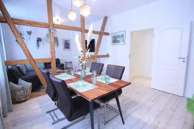 Ein Sitzbereich in der Unterkunft Ferienwohnung Erni-Harz