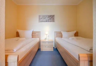 Ein Bett oder Betten in einem Zimmer der Unterkunft Ferienwohnung Efeu