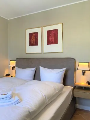 Ein Bett oder Betten in einem Zimmer der Unterkunft Luxus Ferienwohnung Kaminzeit