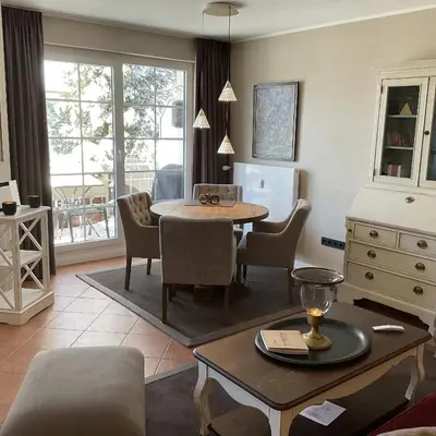 Ein Sitzbereich in der Unterkunft Luxus Ferienwohnung Kaminzeit