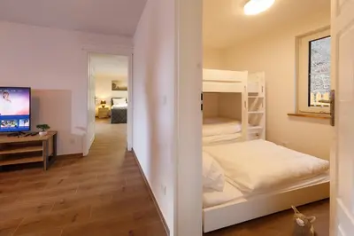 Ein Bett oder Betten in einem Zimmer der Unterkunft Ferienhaus am Wald