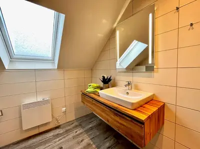 Ein Badezimmer in der Unterkunft Ferienhaus Leni Bettwäsche Handtücher inkl