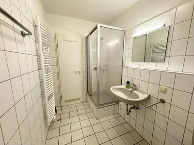 Ein Badezimmer in der Unterkunft STANMA Lodge Braunlage - Naturpartments am Fluss mit Sauna und Bergblick