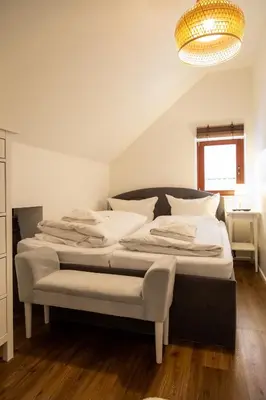 Ein Bett oder Betten in einem Zimmer der Unterkunft Bäckerei Koch Fewo 2