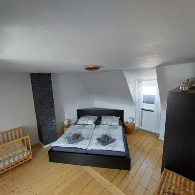 Ein Bett oder Betten in einem Zimmer der Unterkunft Einfamilienhaus Blick zum Rammelsberg