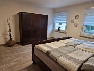 Ein Bett oder Betten in einem Zimmer der Unterkunft FeWoaufdemAdenberg