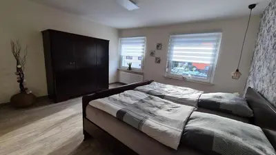 Ein Bett oder Betten in einem Zimmer der Unterkunft FeWoaufdemAdenberg