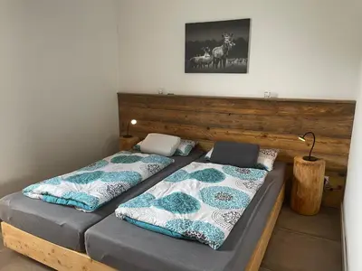 Ein Bett oder Betten in einem Zimmer der Unterkunft Hubertusgrund