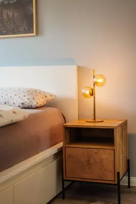 Ein Bett oder Betten in einem Zimmer der Unterkunft FeWo Fuchsbau in ruhiger Lage am Jermerstein