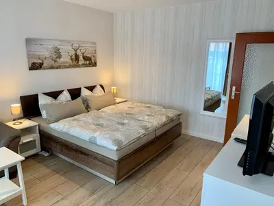 Ein Bett oder Betten in einem Zimmer der Unterkunft Haus Heidi Harz
