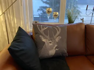 Ein Sitzbereich in der Unterkunft Ferienwohnung KatzenTraum