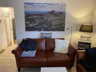Ein Sitzbereich in der Unterkunft Ferienwohnung KatzenTraum