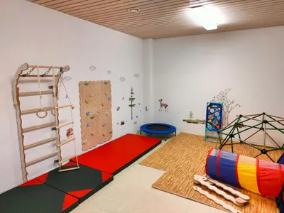 Ein Bett oder Betten in einem Zimmer der Unterkunft Apartment Harzblick - Traumaussicht & Schwimmbad