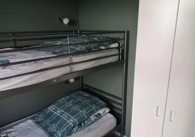 Ein Bett oder Betten in einem Zimmer der Unterkunft Apartment Harzblick - Traumaussicht & Schwimmbad