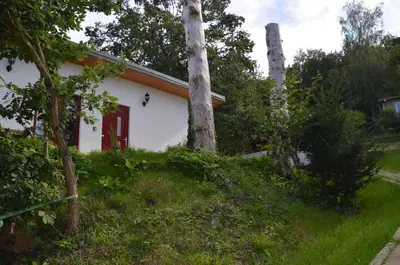 Ein Garten an der Unterkunft Falkennest
