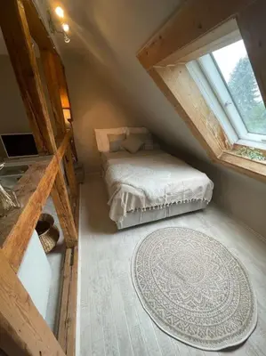 Ein Bett oder Betten in einem Zimmer der Unterkunft Bergrauschen - Baumkrone - Preise inklusive Wäsche