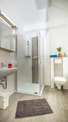 Ein Badezimmer in der Unterkunft Ferienhäuser Ilsestein Doppelhaus, 100 qm, 3 Schlafzimmer