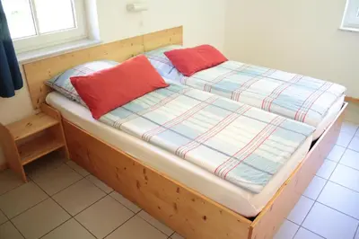 Ein Bett oder Betten in einem Zimmer der Unterkunft Ferienwohnung Ferienhäuser am Brocken, 60 qm, 2 Schlafzimmer