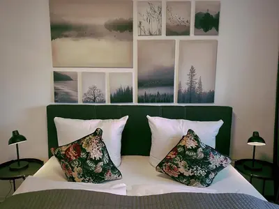 Ein Bett oder Betten in einem Zimmer der Unterkunft Peters Aparthotel