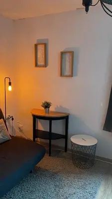Ein Bett oder Betten in einem Zimmer der Unterkunft Peters Aparthotel