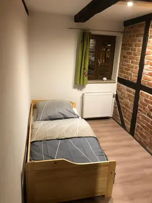 Ein Bett oder Betten in einem Zimmer der Unterkunft Schöne Ecke 13