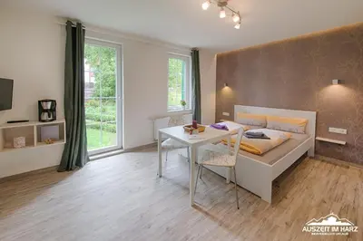 Ein Bett oder Betten in einem Zimmer der Unterkunft Auszeit-im-Harz Haus 2 Wohnung 2