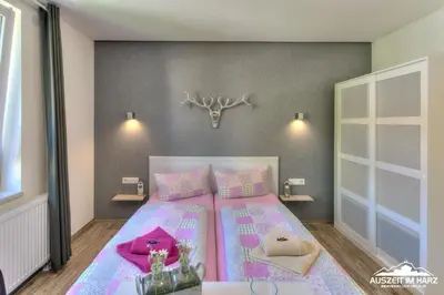 Ein Bett oder Betten in einem Zimmer der Unterkunft Auszeit-im-Harz Haus 2 Wohnung 4
