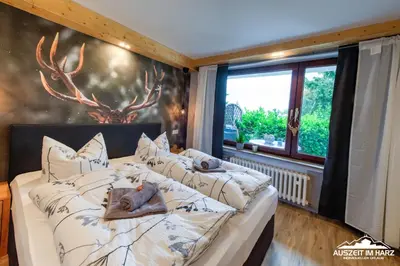 Ein Bett oder Betten in einem Zimmer der Unterkunft Auszeit-im-Harz Haus 3 Wohnung 1