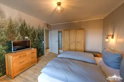 Ein Bett oder Betten in einem Zimmer der Unterkunft Auszeit-im-Harz Haus 3 Wohnung 5