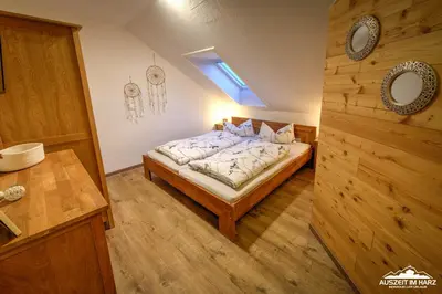 Ein Bett oder Betten in einem Zimmer der Unterkunft Auszeit-im-Harz Haus 3 Wohnung 8
