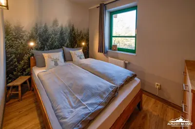 Ein Bett oder Betten in einem Zimmer der Unterkunft Auszeit-im-Harz Haus 5 Wohnung 22