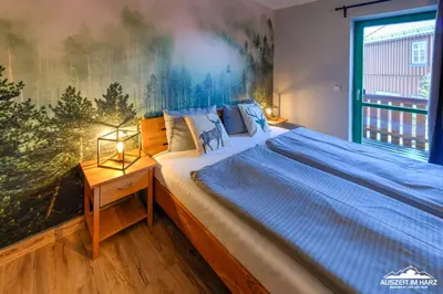 Ein Bett oder Betten in einem Zimmer der Unterkunft Auszeit-im-Harz Haus 5 Wohnung 23