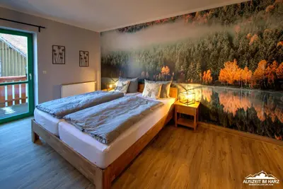 Ein Bett oder Betten in einem Zimmer der Unterkunft Auszeit-im-Harz Haus 5 Wohnung 25