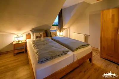 Ein Bett oder Betten in einem Zimmer der Unterkunft Auszeit-im-Harz Haus 5 Wohnung 31