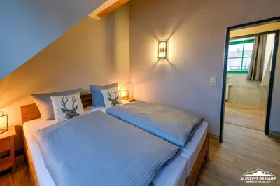 Ein Bett oder Betten in einem Zimmer der Unterkunft Auszeit-im-Harz Haus 5 Wohnung 36