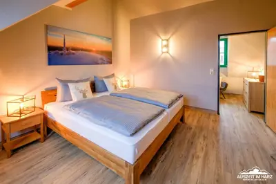 Ein Bett oder Betten in einem Zimmer der Unterkunft Auszeit-im-Harz Haus 5 Wohnung 37